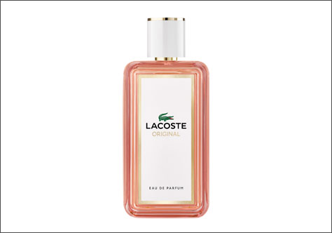 Flakon des Lacoste Original Eau de Parfum: rechteckiger Glasflakon mit roséfarbenem Rand, weißem Etikett und goldenem Verschluss, darauf das grüne Lacoste-Krokodil-Logo und die Aufschrift „Lacoste Original Eau de Parfum“.